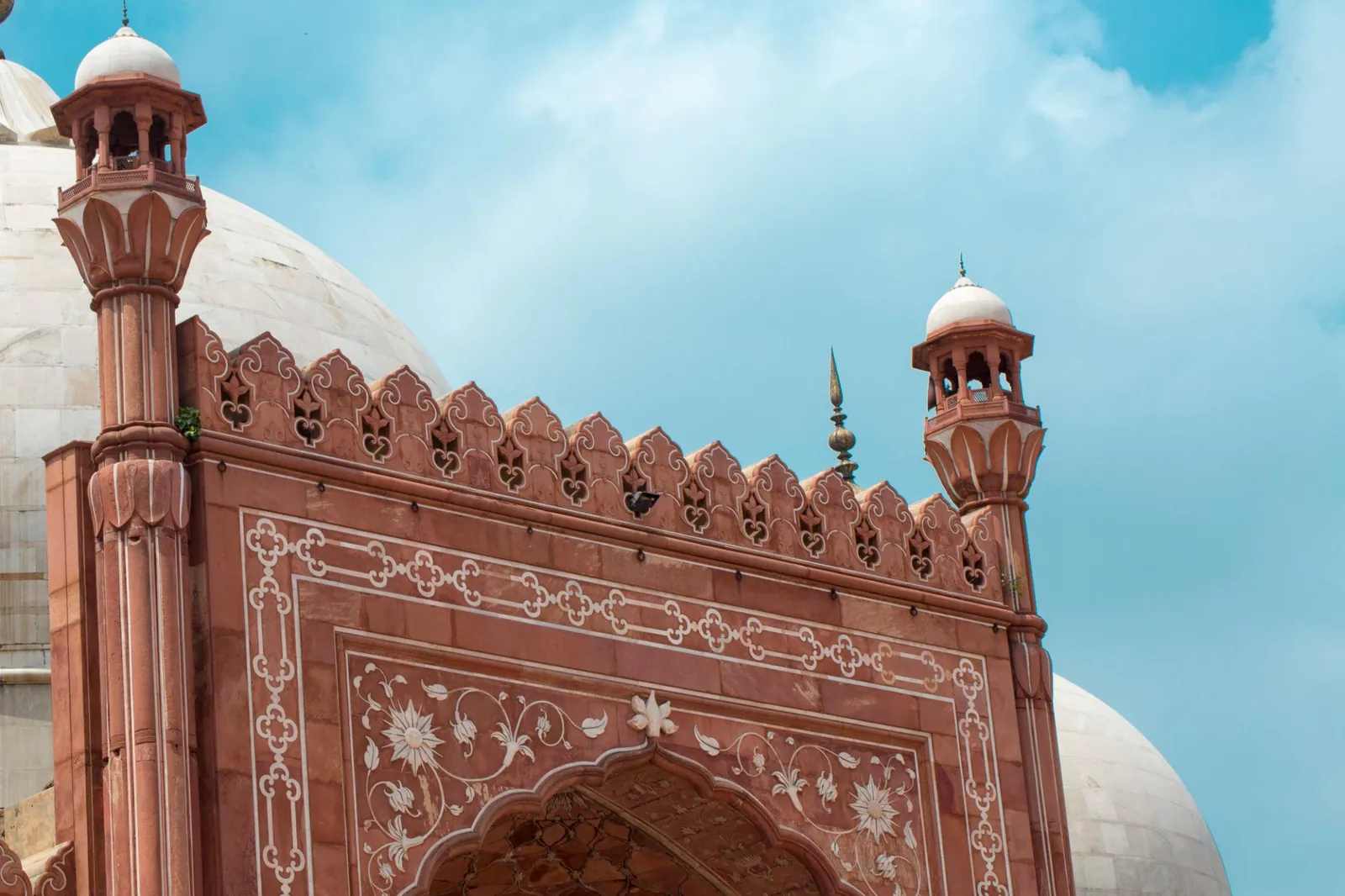 Carved red sandstone and white marble detail at Badshahi Mosque
