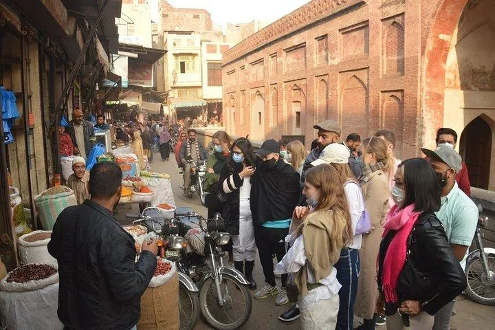 Visitors browsing a spice bazaar in Lahore's Walled City